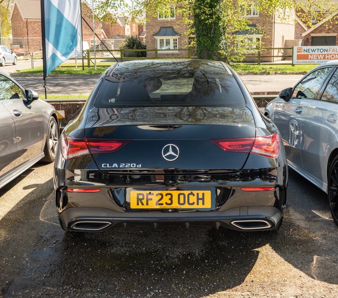 Black Mercedes CLA 220d parked with license plate RF23 OCH.