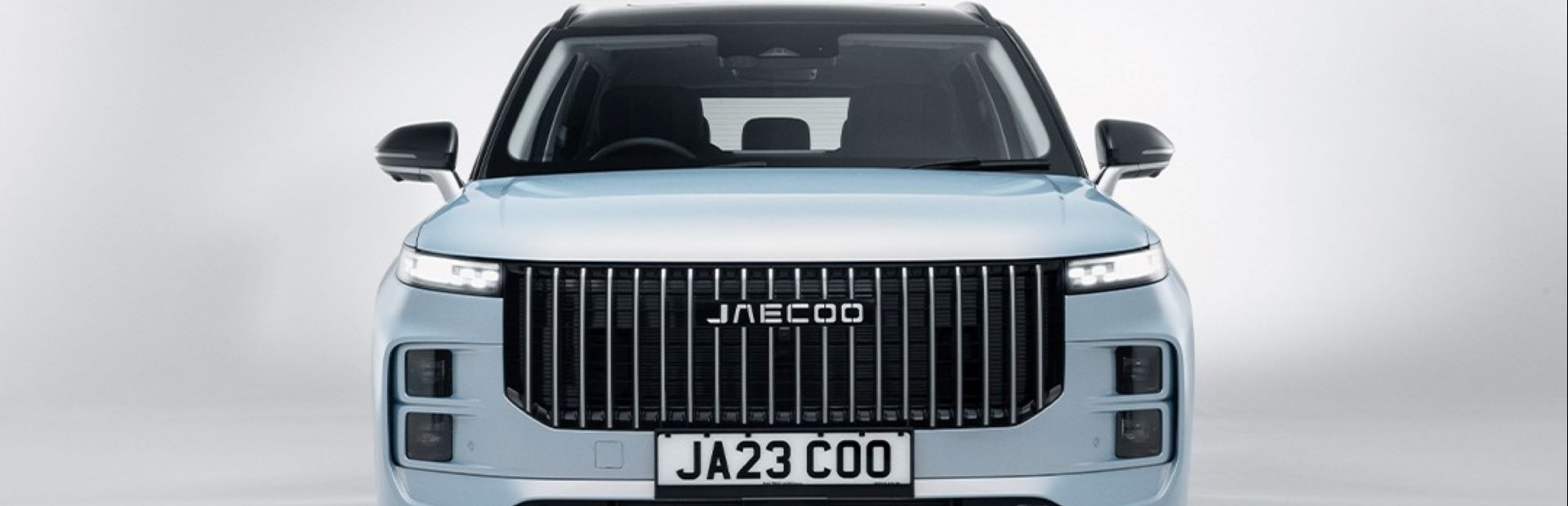 Front view of a blue Jaecoo car with a JA23 COO number plate.