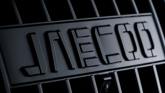Close-up of a car grille with Jaeeco text.